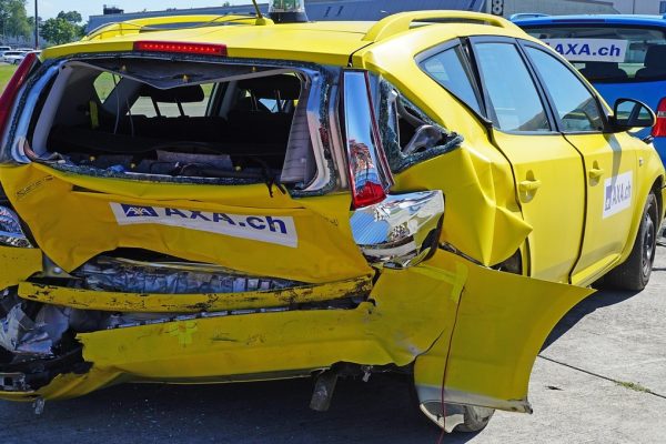 A driver comparing policies to learn how to choose the best car insurance.