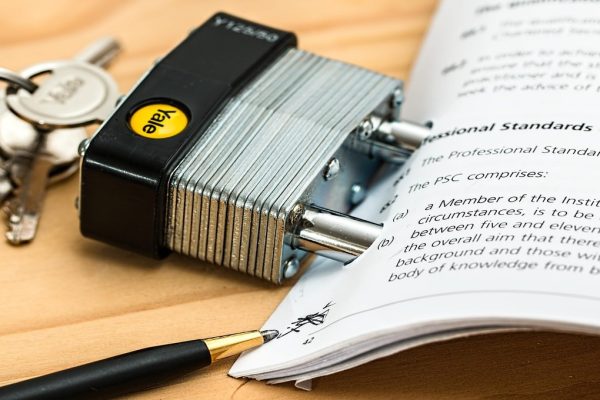 Illustration of how new Tesla insurance rates are set in 2025 with data overlays and a Tesla Model S.